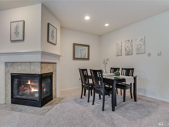 Cozy corner section fireplace to blend Living room to Dinning area. 