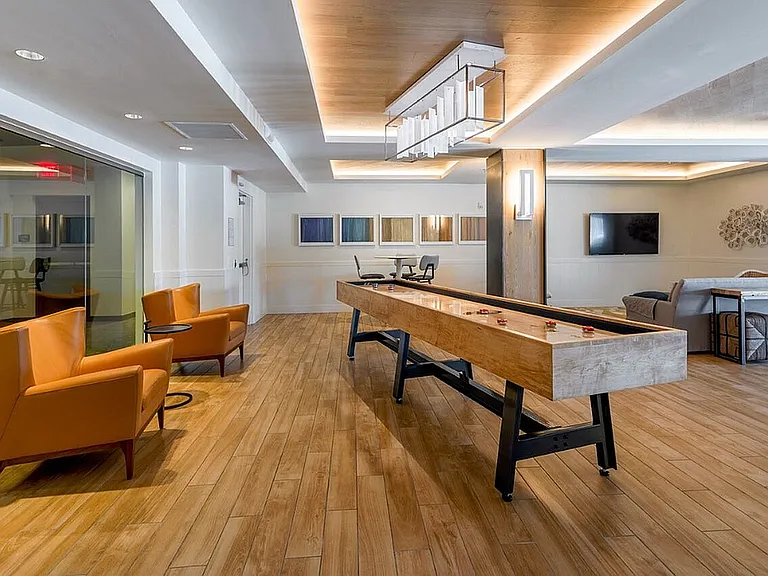 Clubroom with Shuffleboard and Foosball
