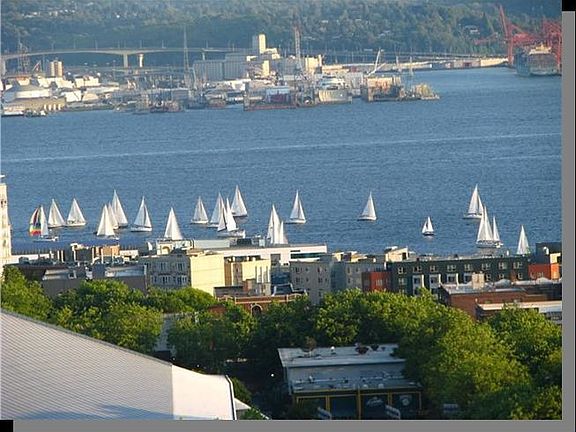 Watch the sailboats and ferries!