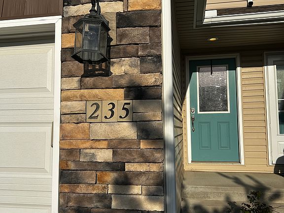 Front Door, with address