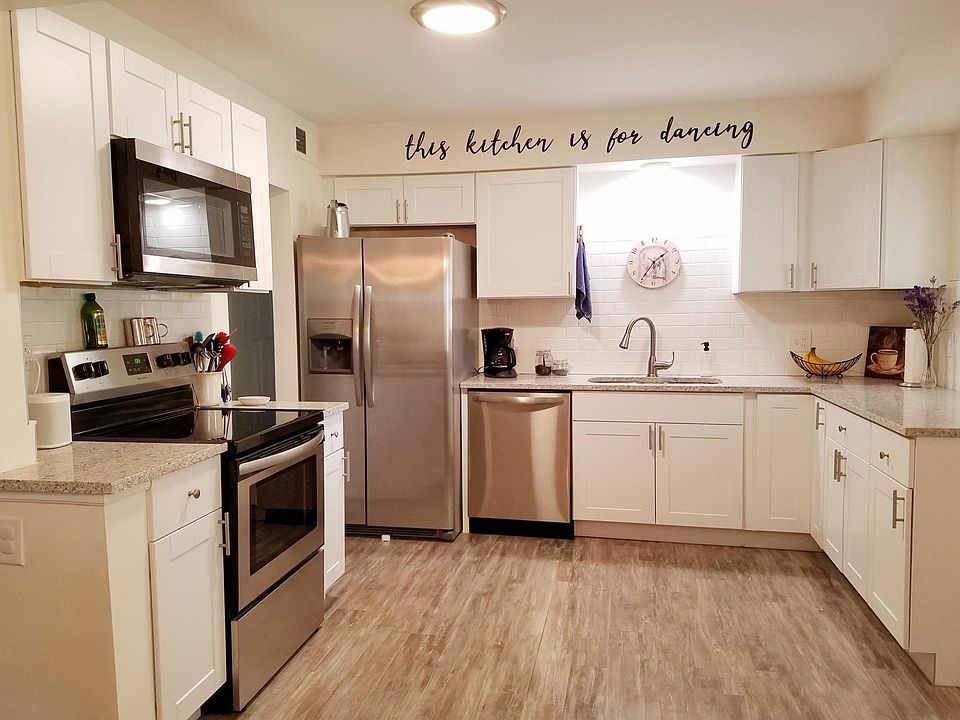 Fully remodeled kitchen with all new appliances and white subway tile backsplash in 2019