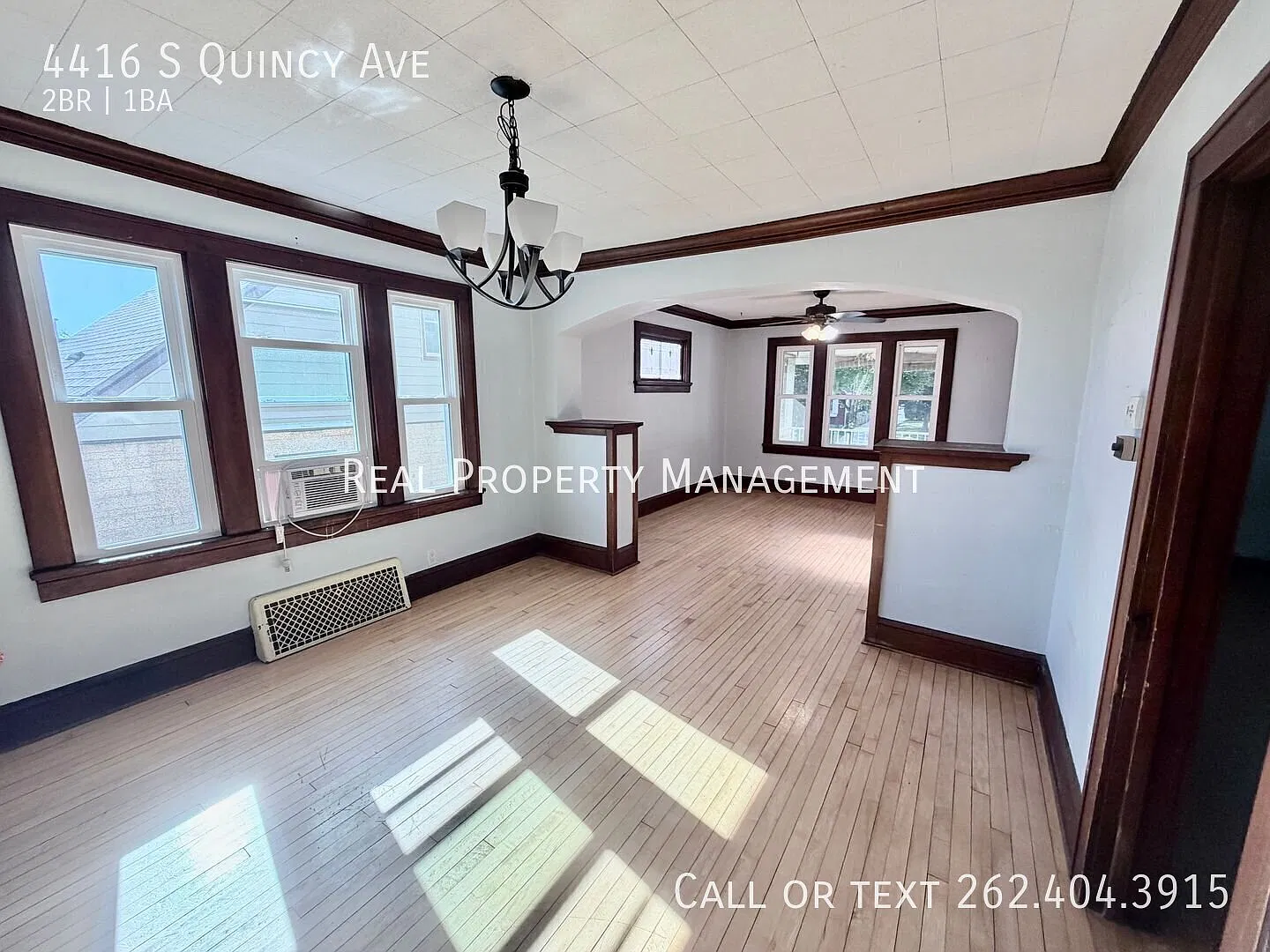 Spacious 2-Bedroom Lower Flat with Garage Heat & Water Included! — Photo 3
