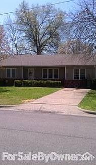 Front of Home off Rice Blvd
						:
						Pretty yard and nice shrubs