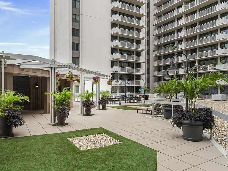 Beautifully Landscaped Courtyard with Seating and Sunning Areas