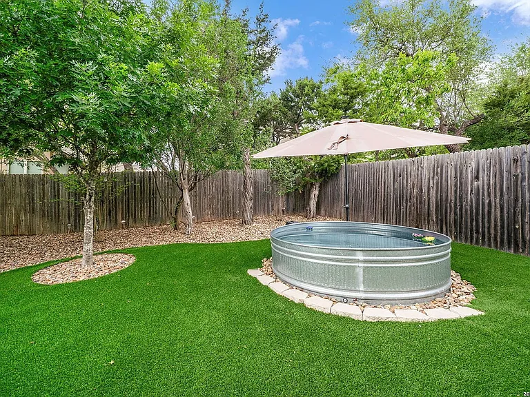 Backyard - Cowboy Pool. Includes pool pump and umbrella for adult and kid play.