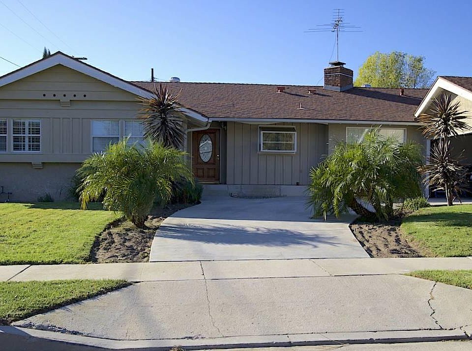 Front with 2 car attached garage