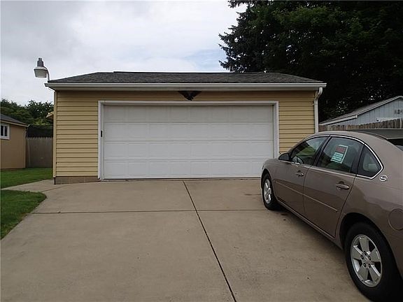 Large two car garage with plenty of storage space!