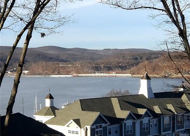 Unobstructed year round Hudson River view from this well maintained townhouse.