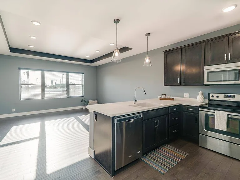 Open-concept layouts connect the kitchen and living areas, providing a seamless space to relax or gather.