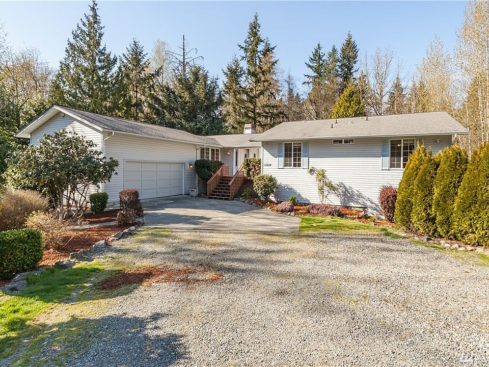 4,500 sq ft home (with 3,550 finished) on a secluded dead-end street.  Property is an acre+, with a stream traversing