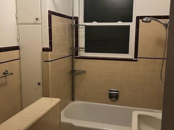Original vintage bathroom with gorgeously redone tub!