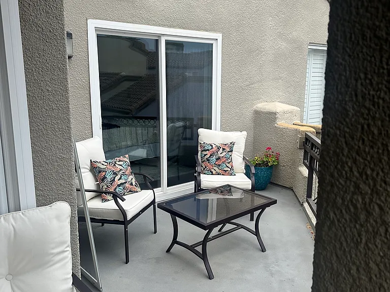 Top Floor Covered Deck off Master Suite Complete with 2 Chairs