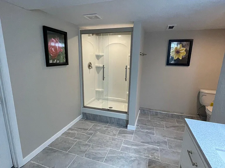 Large dressing area in lower level bath