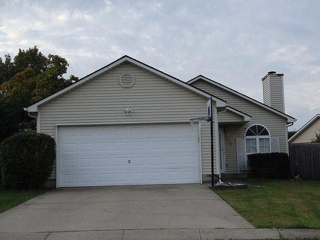 Two car garage and big driveway