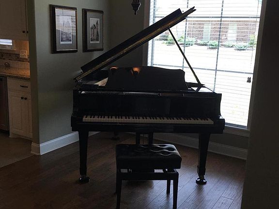 I have a piano in this room but it can also be used as a dining room or sitting area.