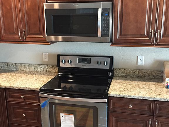 Custom Granite & SS Appliances