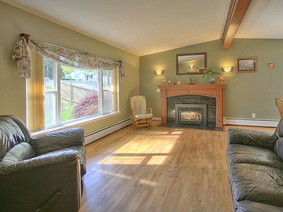 Hardwood Floors, New Windows, Cherry Mantle