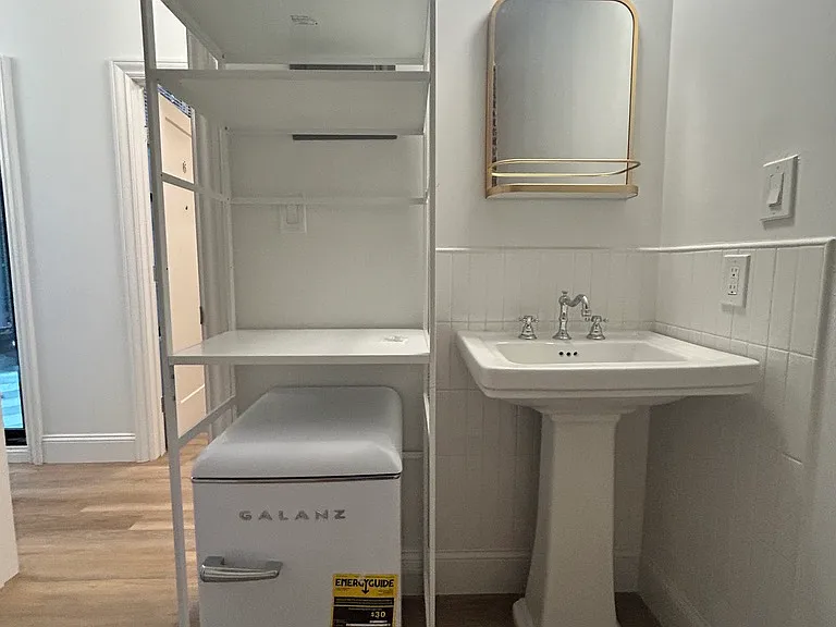 A mini fridge, twin storage bed and brand new mattress are included in our furnished rooms. Bedding not included.