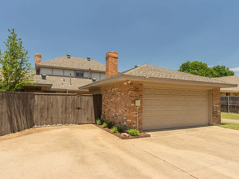 Large 2 car garage is in the rear.