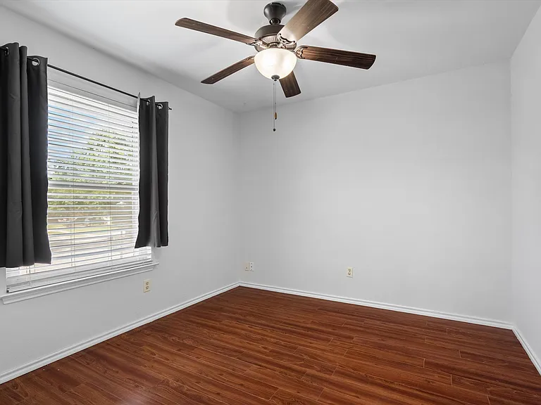 The third bedroom has a ceiling fan and could make a good office space if needed.
