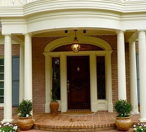 Elegant front entry with fluted columns