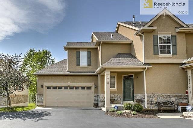 Great end location with 2 car attached garage!