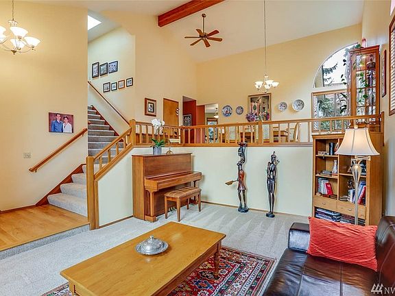 This open-concept living room flows to the elevated dining room creating an amazing entertaining space.