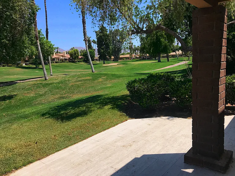 View of 4 West fairway and green from patio