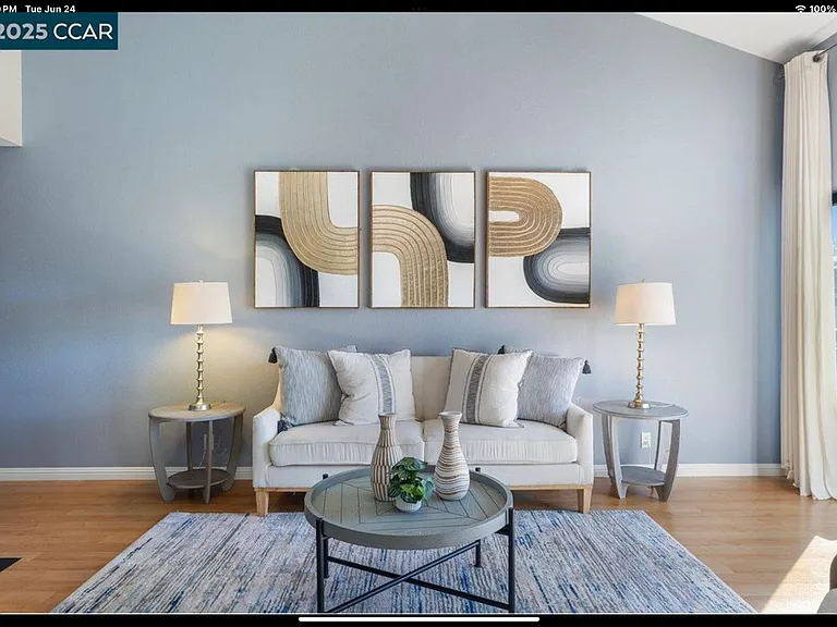 Living area with cathedral ceiling