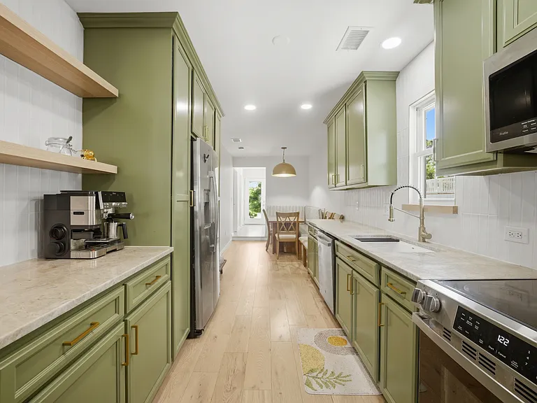 Kitchen view from living room entrance.