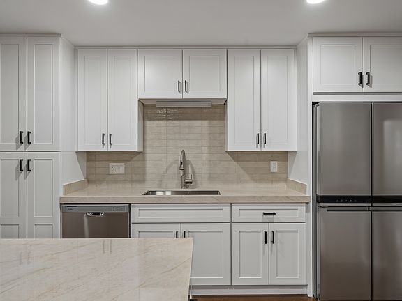 New Kitchen w/ Custom Tile and Stainless Appliances