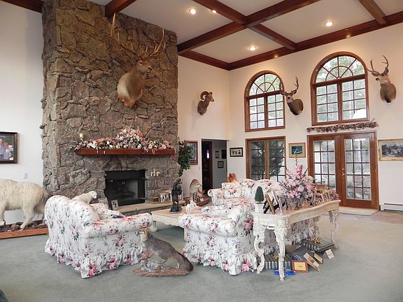 Living Room w/ 16 ft ceiling