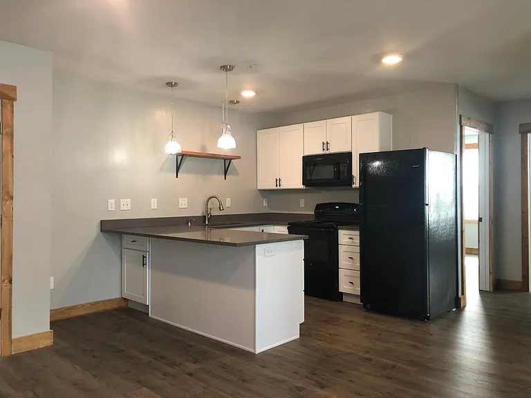 Open concept living. Kitchen & living room open to each other. High-end finishes: Quartz countertops, soft close cabinets.