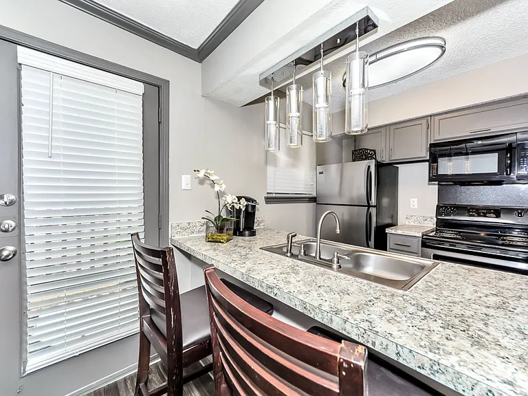 Open kitchen design perfect for cooking, dining, and entertaining.