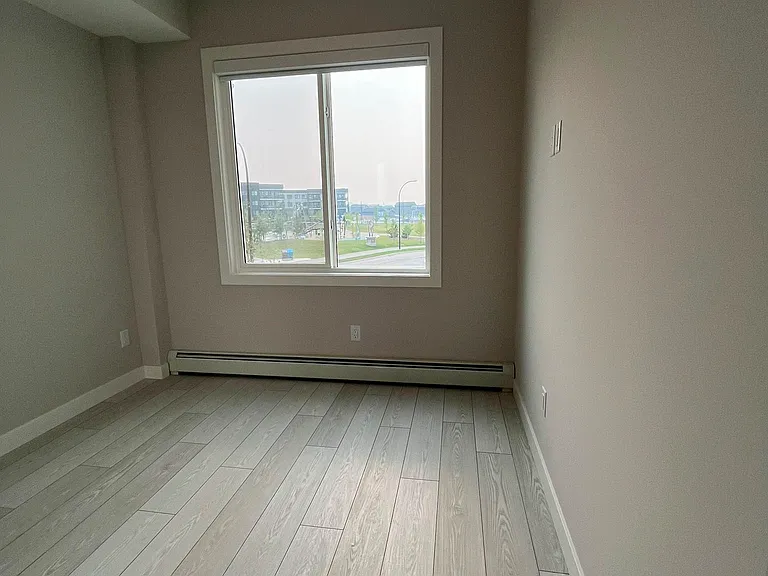 265 Wolf Willow Blvd SE #308 — Photo 6