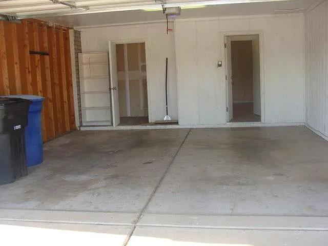 2 Car Garage w/Storage Room