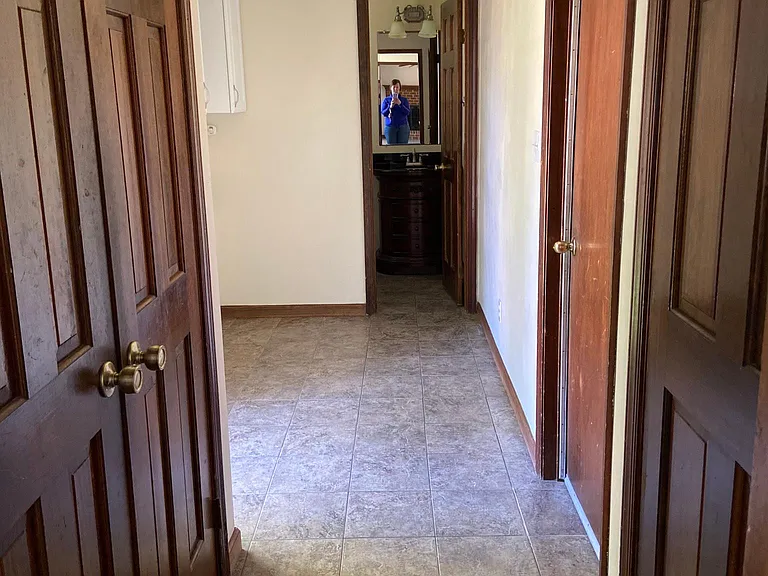 Laundry area with 1/2 bath at the end.
