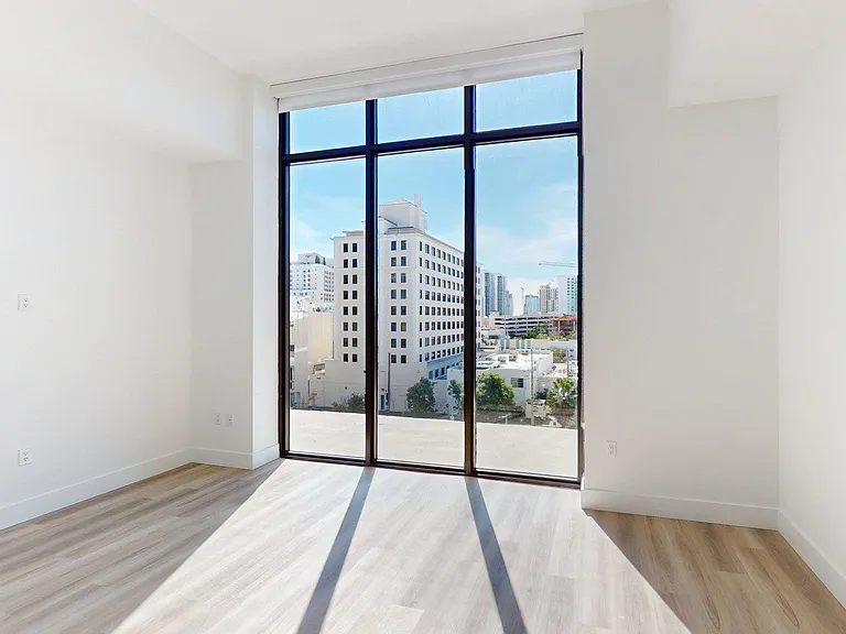 Apartment Living Room with Wood Style Flooring and Patio/Balcony.