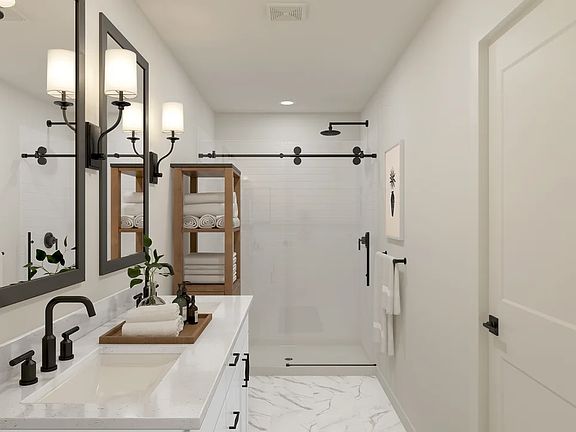 Primary bath with glass shower enclosure