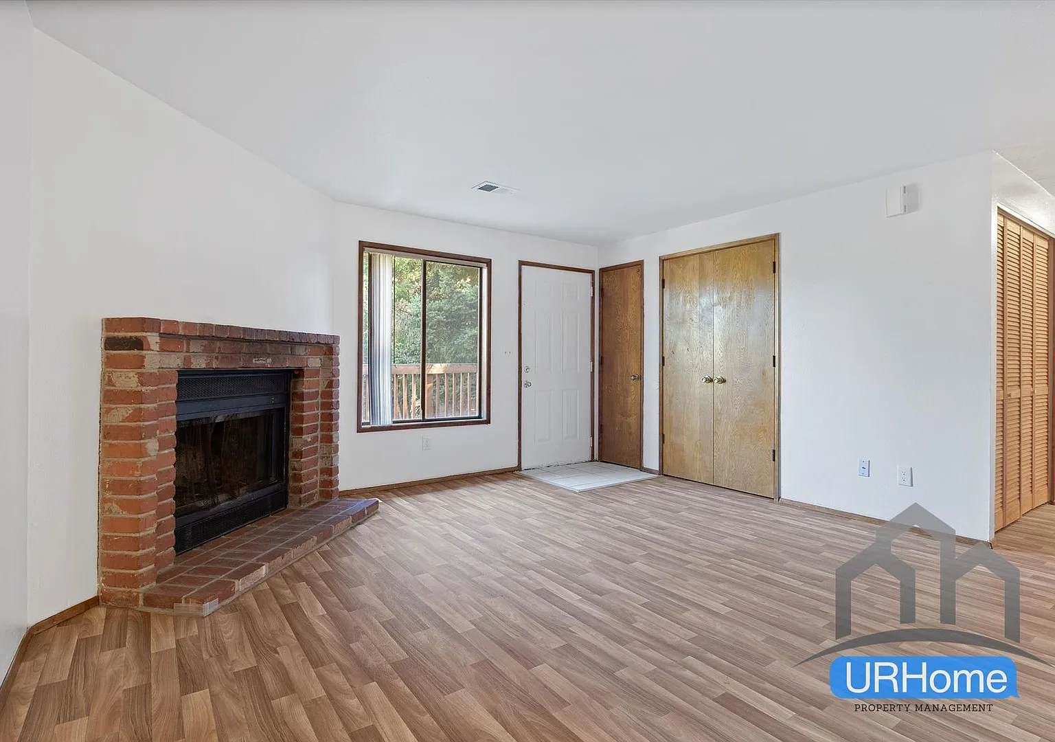 Inviting 2-Bed Retreat | Fireplace, Garage & In-Unit Laundry — Photo 2