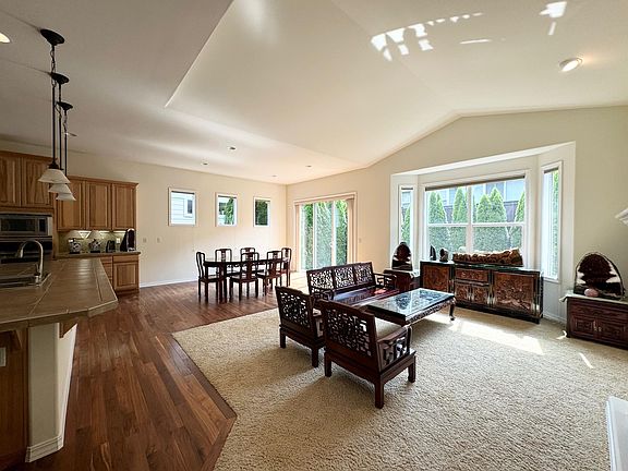Soaring ceilings and tons of natural light in this open great room!