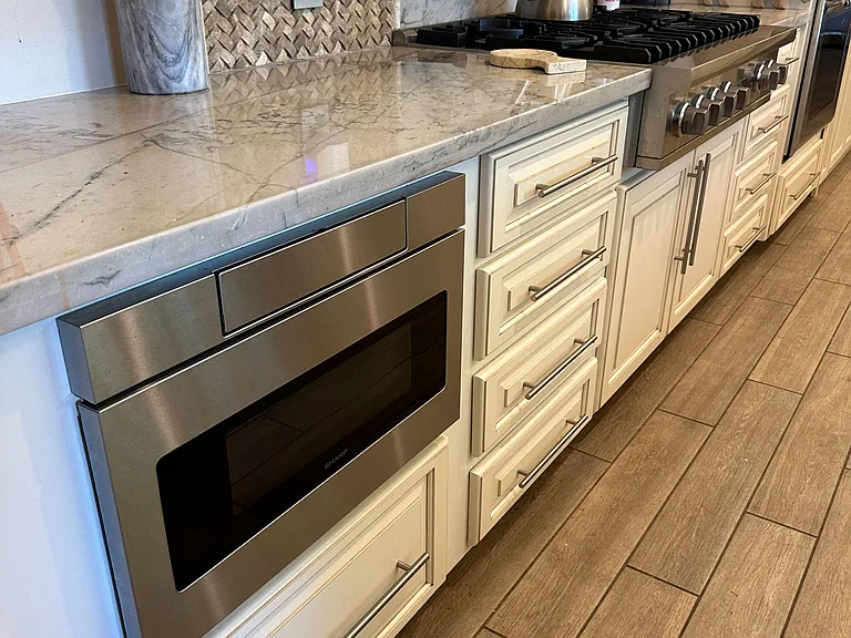 Additional counter space with microwave.