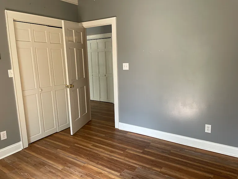 Nice bedroom with high ceilings and a great closet