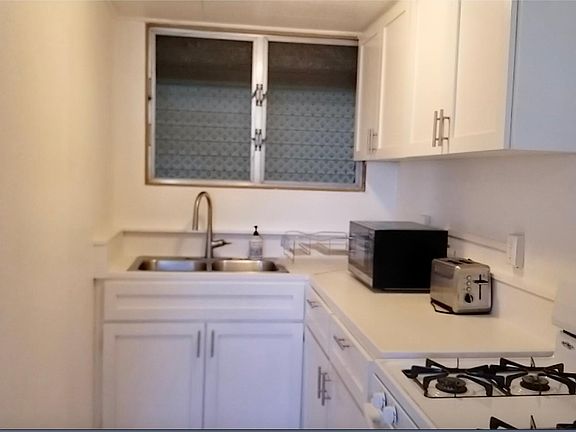 Kitchen with brand new kitchen cabinet doors.