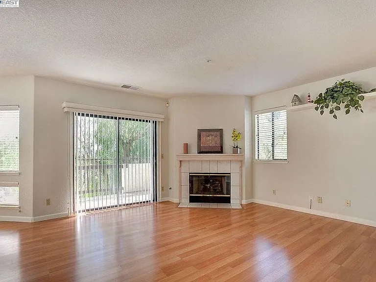 Living room empty (Photo taken before our recent flooring upgrade)