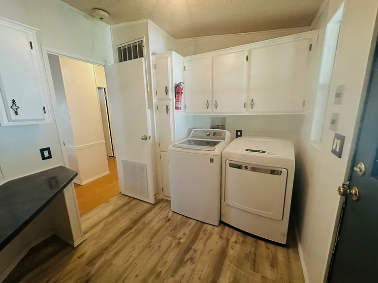 Washer, dryer and tons of storage.