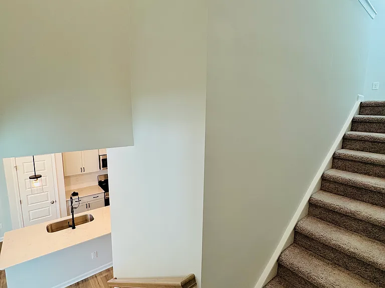 Upstairs to Loft+ Bedrooms