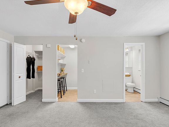 Discover expansive open layouts with plush carpeting, a separate kitchen area, modern bathroom, and large walk-in closet. Wood-style flooring is available for premium first floor studios.