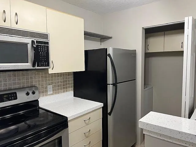Kitchen and washer and dryer