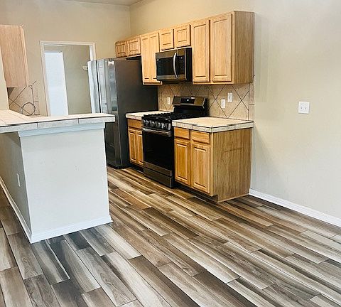 From living room looking into kitchen.